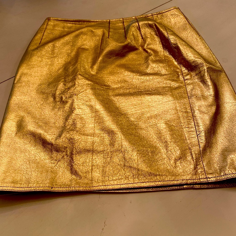 Gold leather fully lined skirt.
